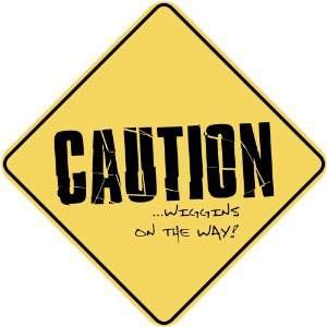   CAUTION  WIGGINS ON THE WAY  CROSSING SIGN