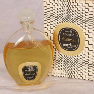 this auction is for a vintage 40 year old 90ml eau de toilette bottle 