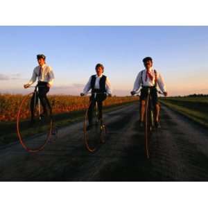  A Family, Dressed in Period Attire, Ride Old Fashioned 