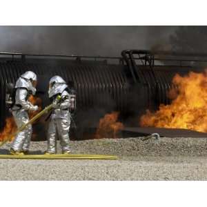  Firefighters Neutralize a Live Fire Premium Poster Print 