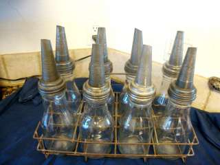 The Master oil bottles with a wire rack  