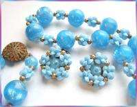 This fabulous and fun 1950s necklace is made of electric ice blue 