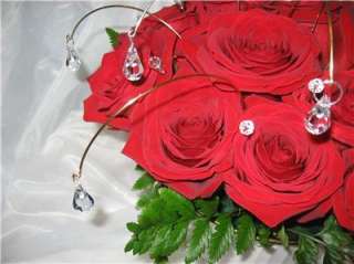   Round Bottom German 20mm Crystals adorning these red rose Cake Topper