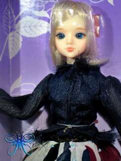 This auction is for the Stroget J Doll doll.