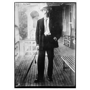  Photo R.E. Peary, standing, with umbrella 1900