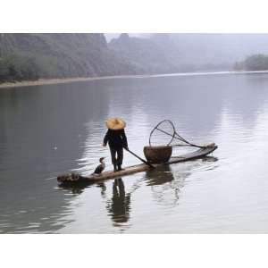 Cormorant Fisherman on Bamboo Raft, Li River, Guilin, Guangxi, China 