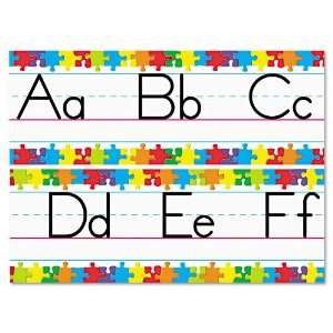   writing with this alphabet line.   Multicolor puzzle pieces surround