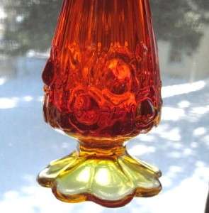 This auction is for a Mid Century Design amberina glass bud vase 
