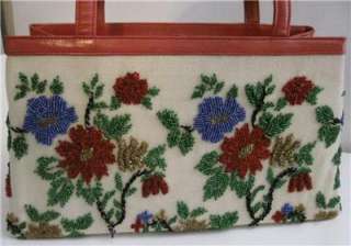   , NICOLE MILLER, heavily beaded and red leather, floral motif purse