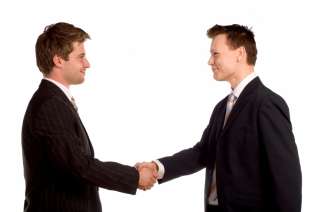Two business men shaking hands