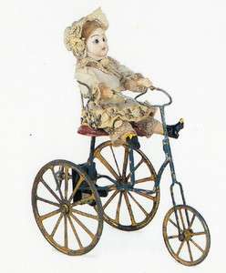   PostcardAntique FRENCH DOLL Bisque + Tinplate Tricycle 19th century