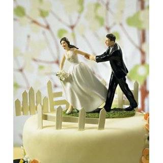    Climbing Groom and Victorious Bride Cake Topper