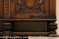 Magnificently hand carved about 1900 of solid oak, this Renaissance 