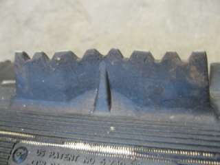 This is a used Camoplast track for a snowmobile.
