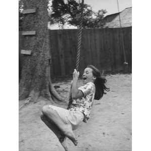  Daughter of Astronaut James A. McDivitt Swinging at Home 