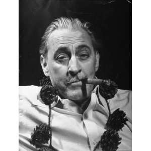 John Barrymore Wearing Pine Cone Necklace While Smoking Cigar in Scene 