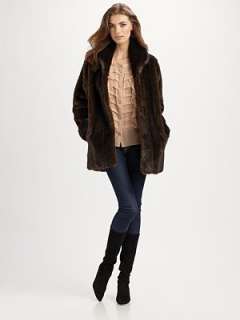 Shawl collar Long sleeves European fur closures On seam side pockets 