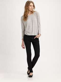 Round neck Three quarter sleeves Pull on style About 24 from shoulder 