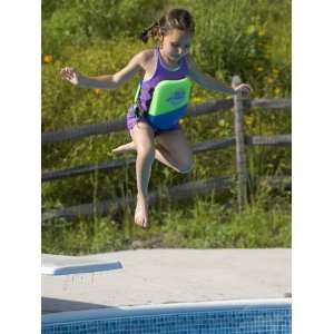 Year Old Girl Jumping Off Diving Board into Swimming Pool, Woodstock 