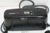 YASHICA T4 . 35 MM FILM CAMERA CARL ZEISS T * LENS  