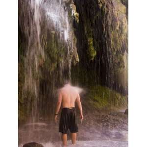  A Man Enjoys a Massage from a Waterfall National 